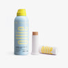 Dupla FPS e Make resistente, composta pelo protetor solar corporal em aerossol FPS 50, e Protetor solar em bastão com cor FPS 95 da Ollie.