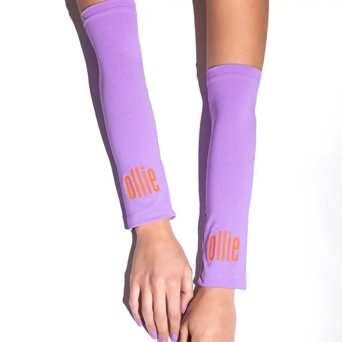 Manguito FPU50+ da Ollie em roxo, oferecendo conforto e proteção solar UV50+ para atividades ao ar livre.